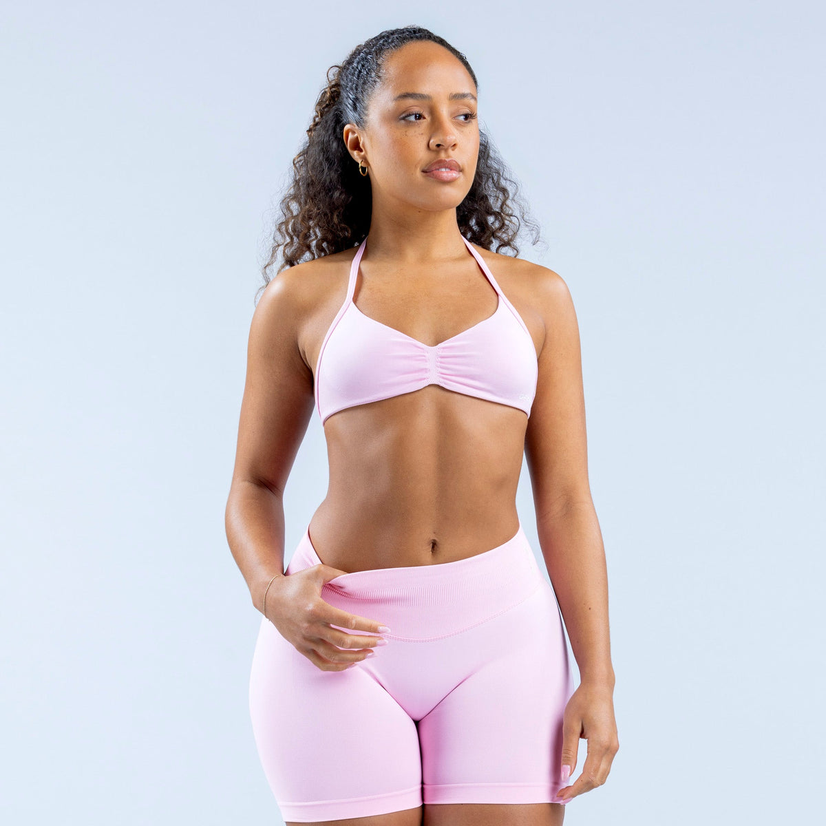Light pink strappy bra with ruched middle detail and thin spaghetti straps